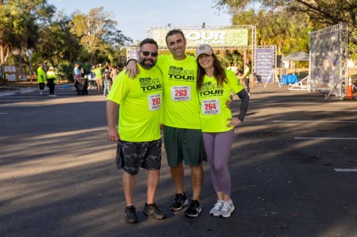 Runners smile after completing the 5k run/walk at the 35th Annual Tour De Cape in 2026.